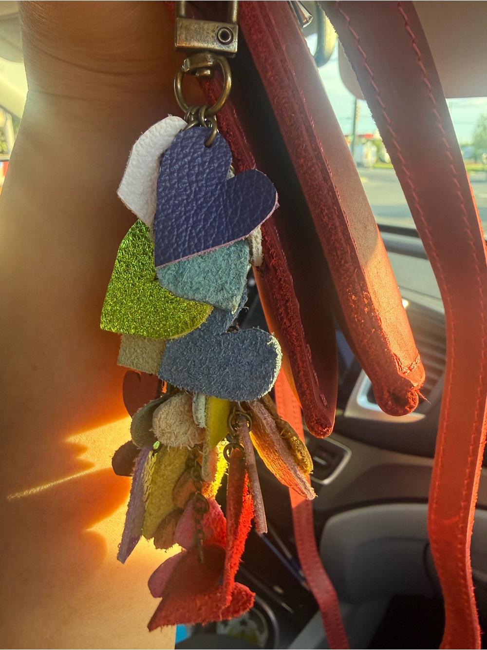 Custom leather “falling hearts” charm